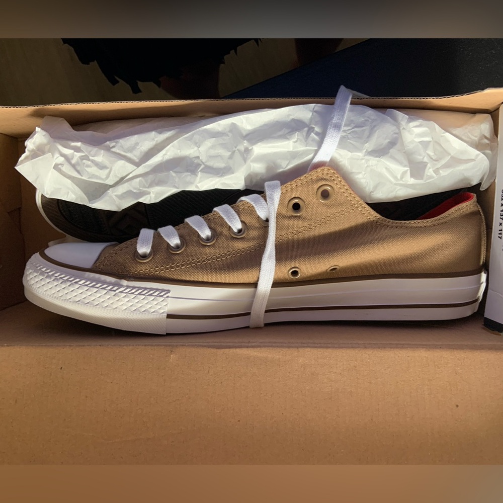 NWT Size Men’s 11 or Women’s 13 Converse All Star in tan.